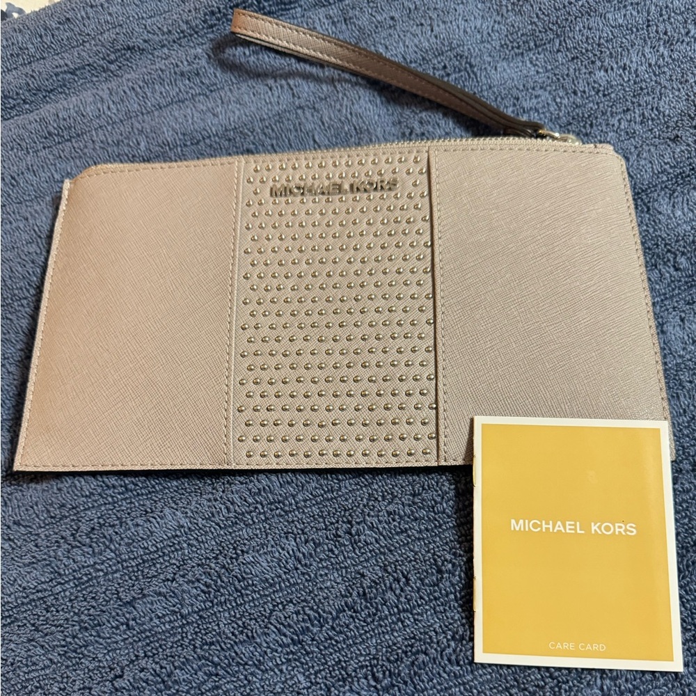 Michael Kors wristlet. Never been used.